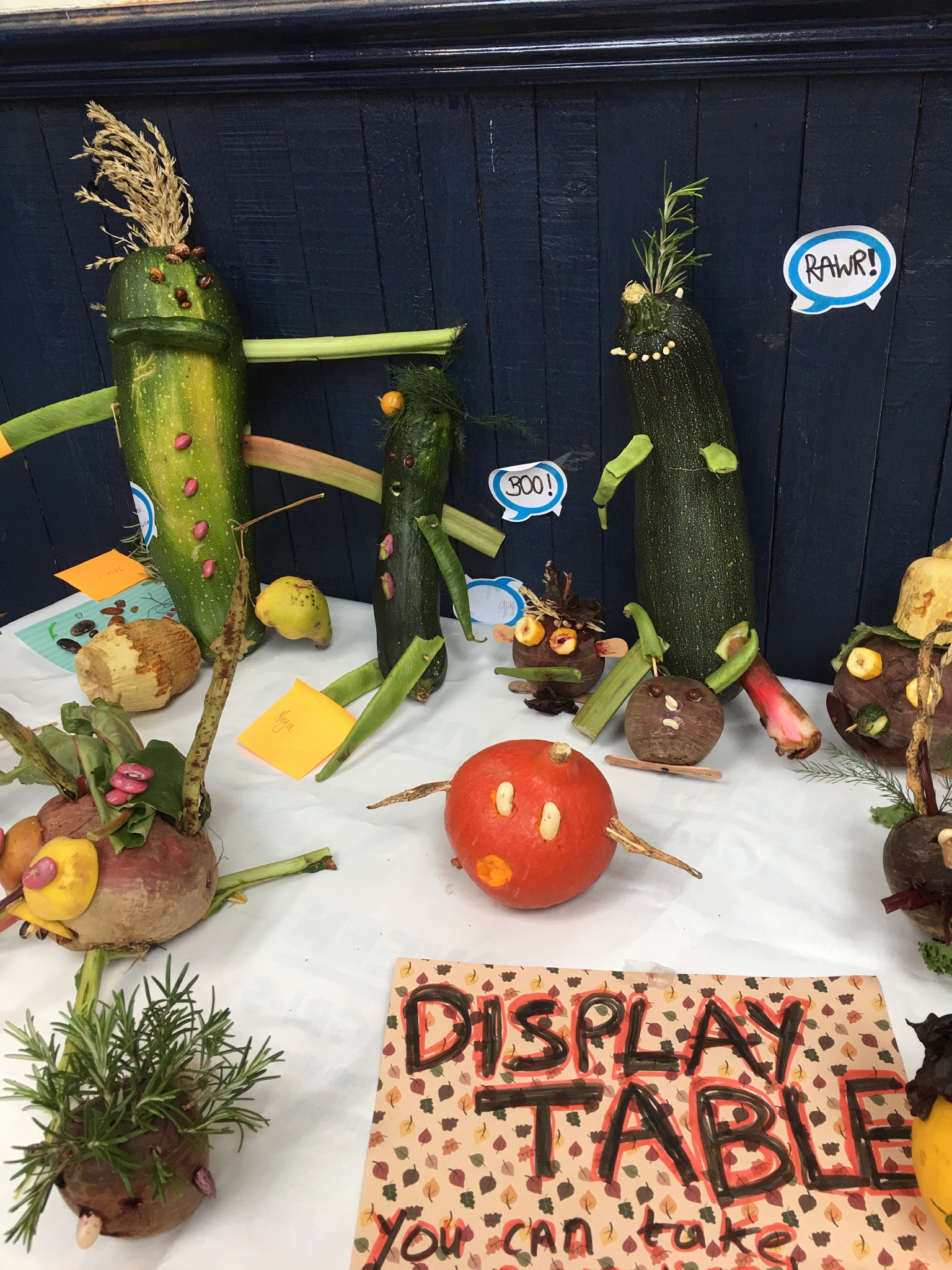 Corgettes decorated as people using other vegetables